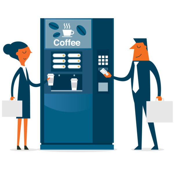 Image of two people standing by a coffee machine.