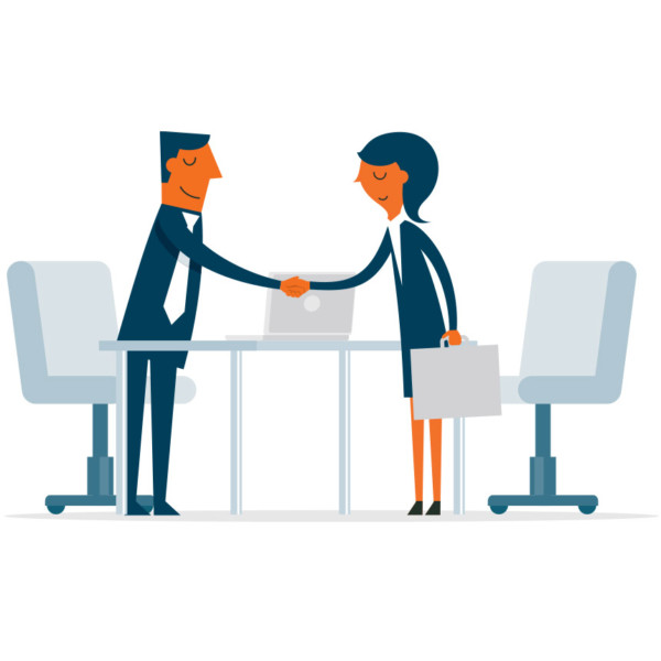 Image of two people shaking hands over a desk.