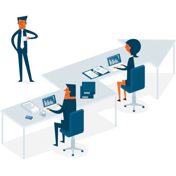 Image of two people working at a desk that is shaped like an arrow.