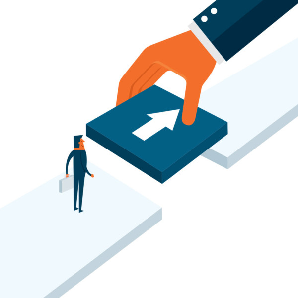 Image of a large hand putting an arrow tile on a pathway.