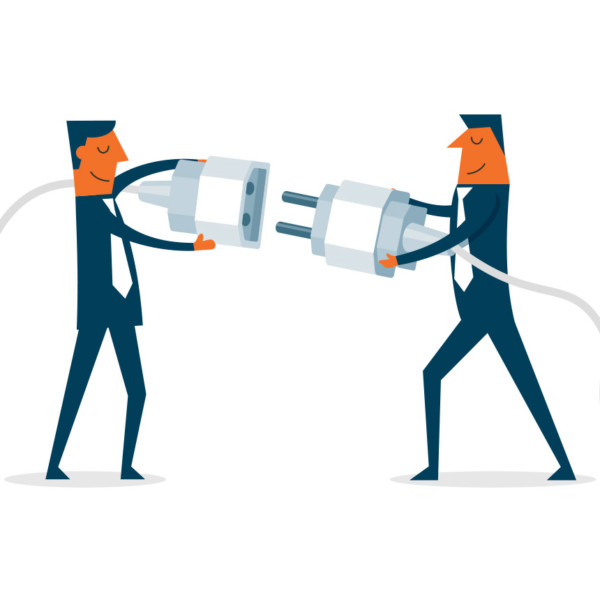 Image of two people connecting electrical cords together.