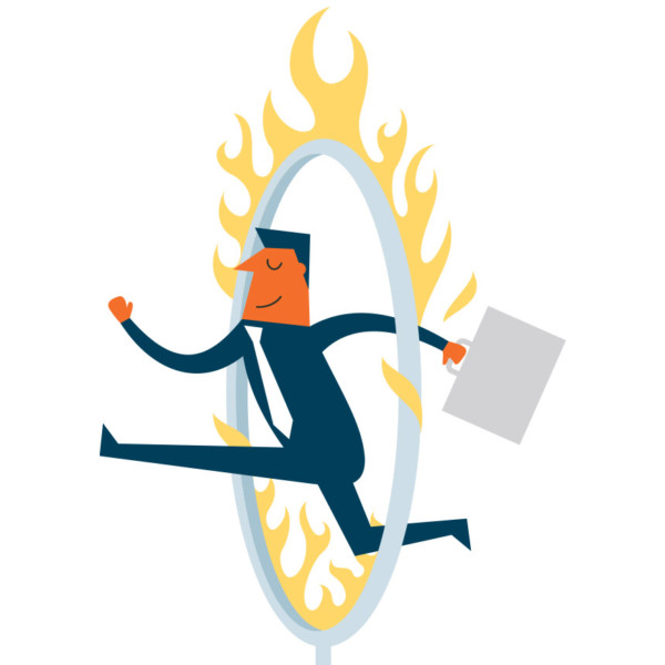 Image of someone jumping through a ring of fire.