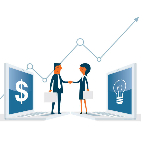 Image of two people shaking hands between two computers