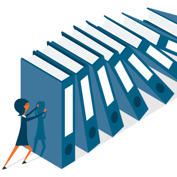 Woman holding up falling books