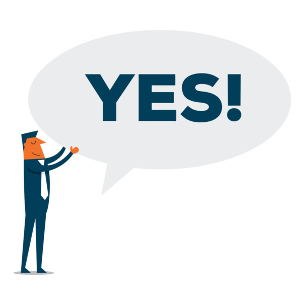 man holding a yes text bubble
